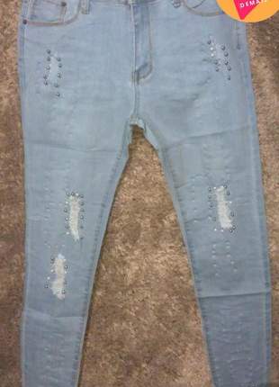 Calça jeans skinner com lycra