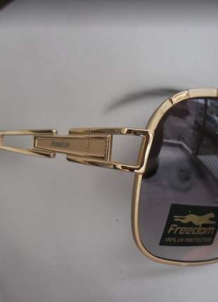 Óculos de sol freedom última peça modelo j58143