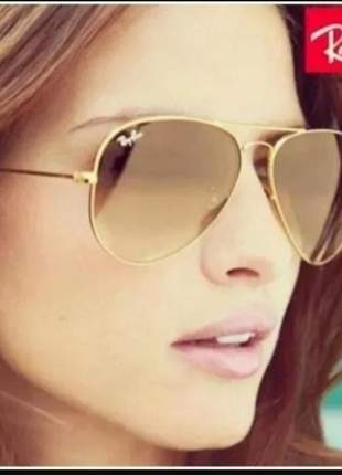 Óculos aviador feminino ray ban dourado com lentes marrom ou preto.